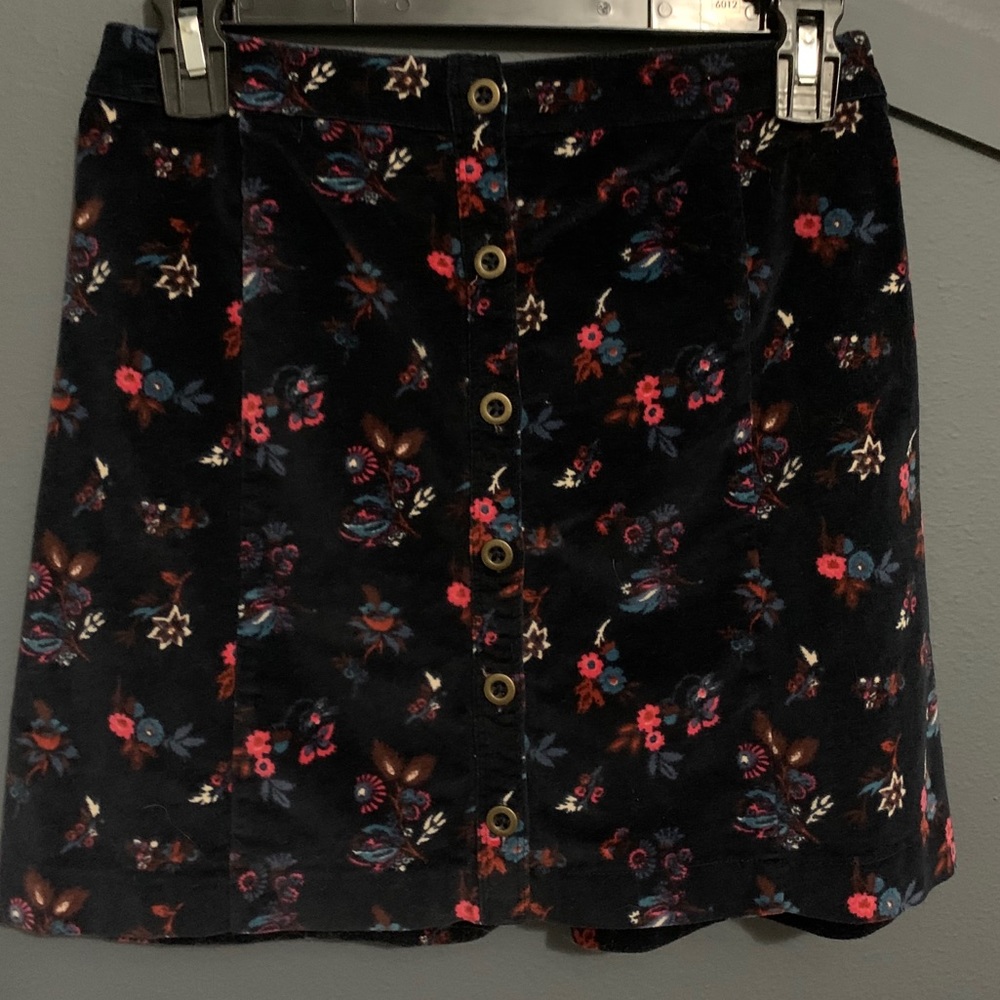 Black floral mini skirt